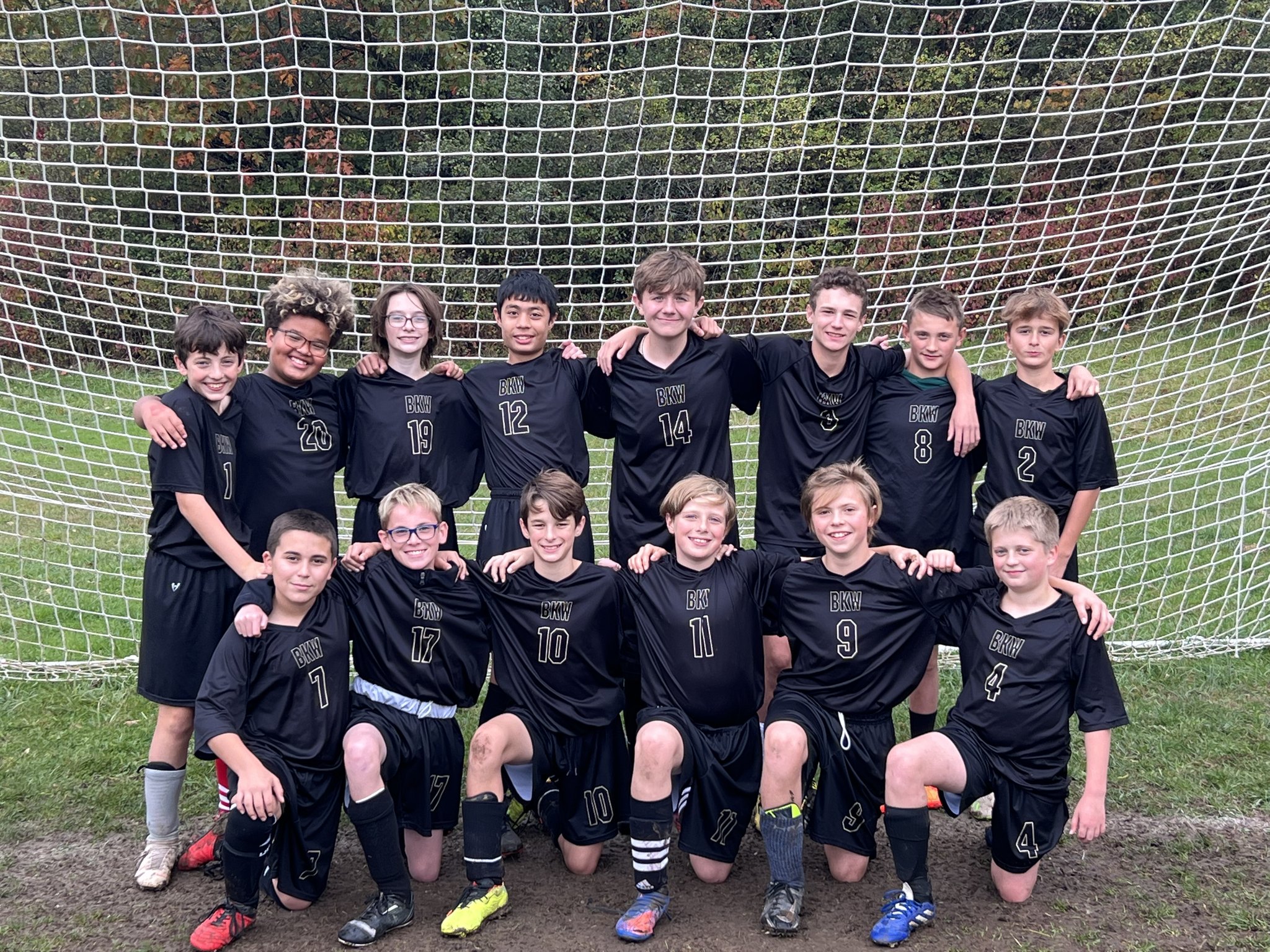 boys soccer team posing for photo