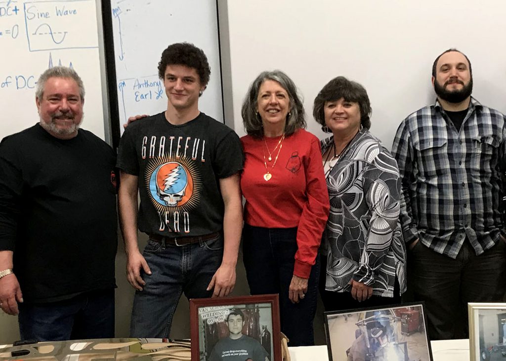 John Schwarz, Jake Wideman, Donna-Marie Schwarz, CTE Business Liaison Nancy Liddle and welding teacher Don Mattoon pose for a picture.