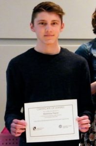 BKW student Matthew Payne stands with his award at the 2018 Capital Region Media Arts Festival.