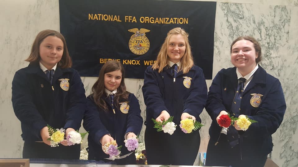 BKW FFA students hold boutineers they made for the Ag Day Celebration at the NYS Capitol