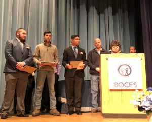 William Creter stands between two other students after receiving the Construction/Heavy Equipment Advisory Board Scholarship Award