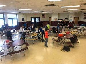 distant shot of students wrapping