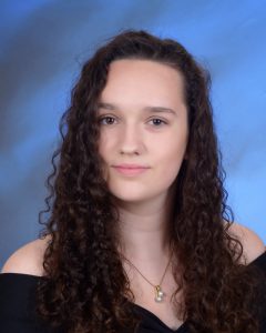 portrait of girl with curly black hair