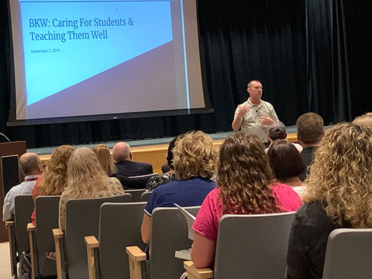 Superintendent Dr. Timothy Mundell speaks in auditorium