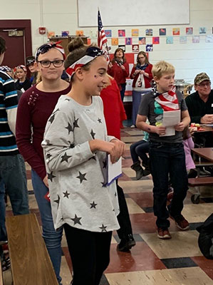 students dressed in red white and blue