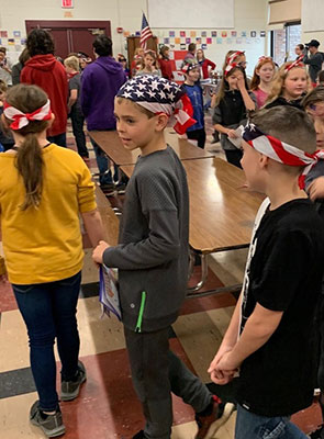 students dressed in red white and blue