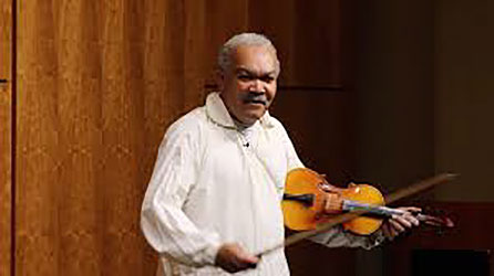 Clifford Oliver as Simon Northrup, holding violin