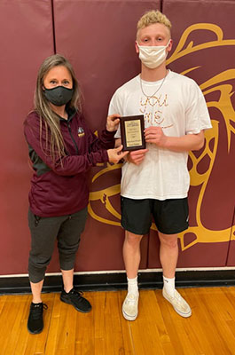 Amanda Gorman and Zeke Pulliam holding award