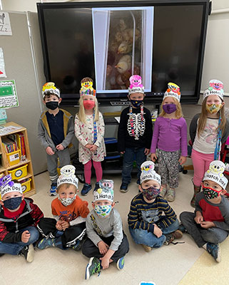 group of students wearing Hatch Day hats