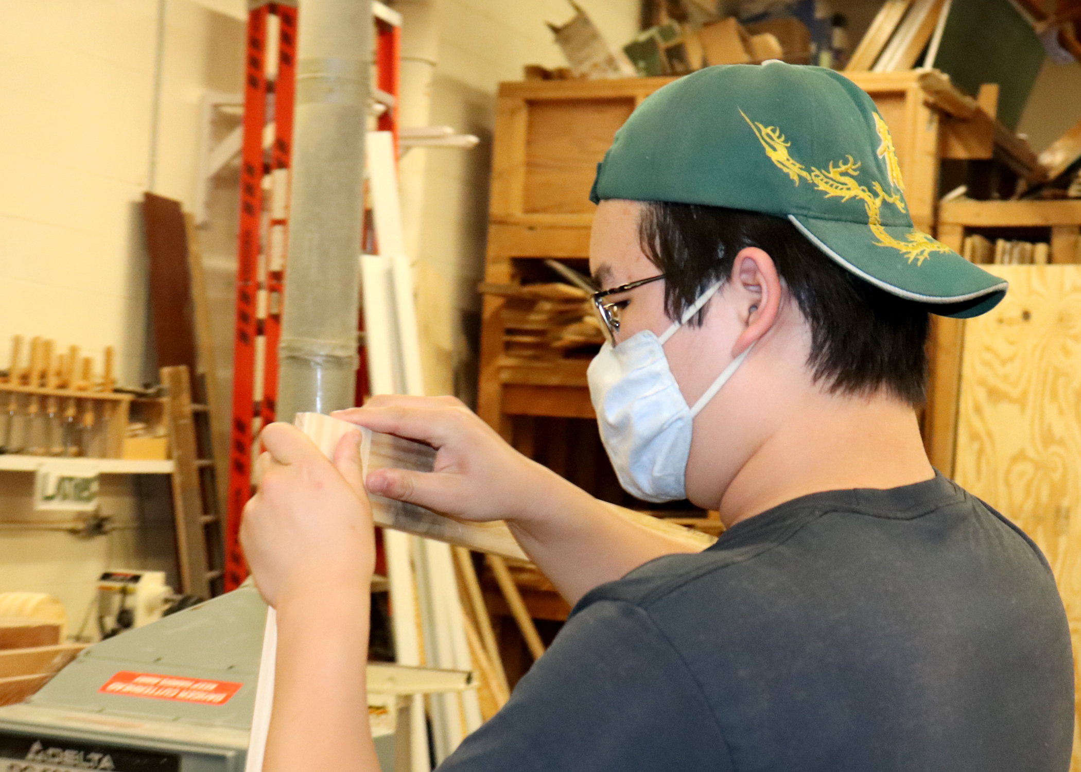 students works on a carpentry project