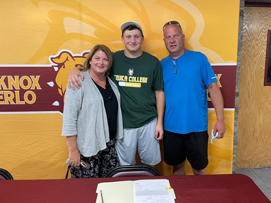 Quinn at signing with family