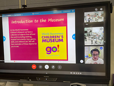 museum program information on a slide on pc screen