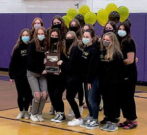 swim team posing as a group