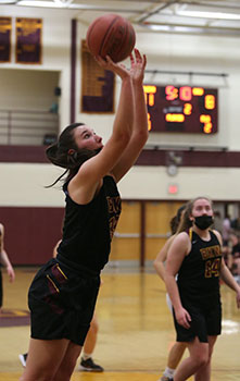 Alexis Wright playing basketball