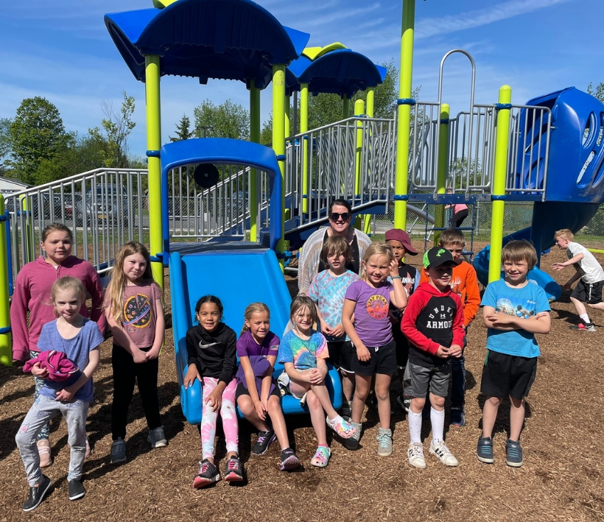 Students in a group on the new playground