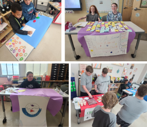 students sitting at decorated tables, standing at table