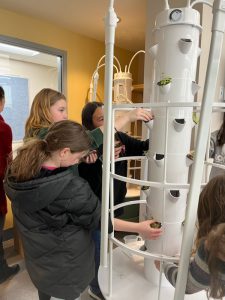 BKW students hard at work planting various herbs and vegetables into their Tower Gardens on Monday, March 13.