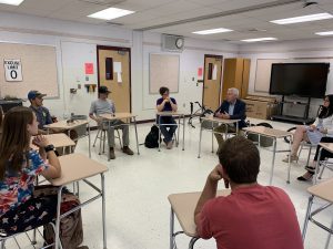 Dr. Placke holding a discussion with BKW students as part of his visit to the district on Friday, May 26.