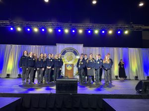 BKW FFA students posing on stage at the 98th New York State FFA Convention in Buffalo, N.Y.
