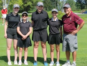 From left to right: Lauren Murphy, Emma Carey, Skylar Stevens, Alexa Hubbard and Coach Dennis.