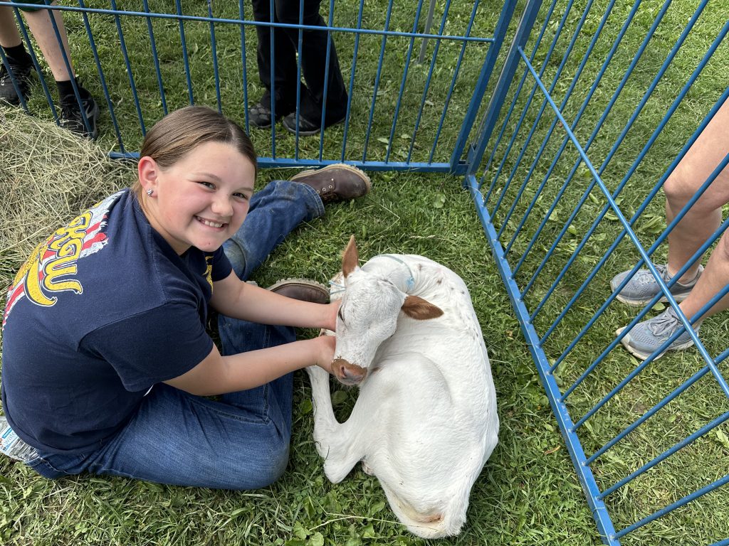 FFA Ag Day is about having fun and learning! Today, students were introduced to a five-day-old baby calf. She officially gained her new name Frosty.