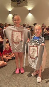 Blue Book Bag winners were announced which celebrated student reading achievements.